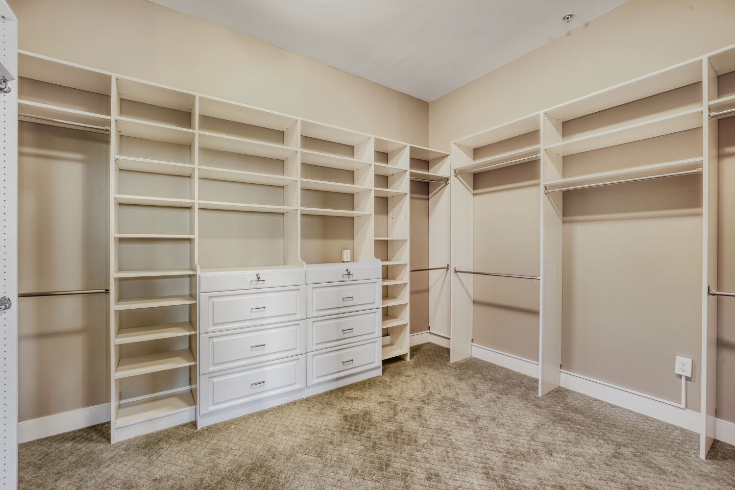 Her custom primary walk-in closet